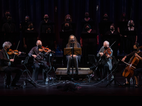 Kronos Quartet performing with Nikky Finney (center) and a chorus of local artists in South Carolina on Nov. 7, 2021.