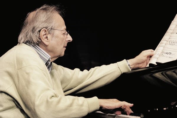 Poster Andre Previn at the piano.