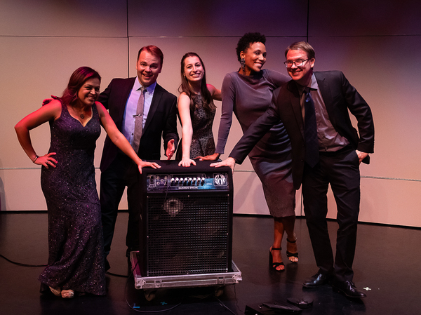 The Apollo Chamber Players pose before their fall concert, "Banned" in Houston with a guest instrument — a stomp box — and composer and performer Allison Loggins-Hull.