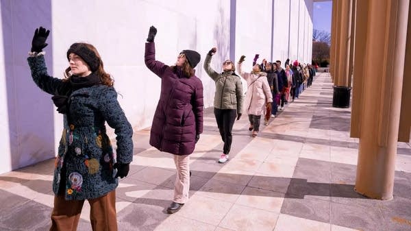 Poster Performers dance outside of the Kennedy Center