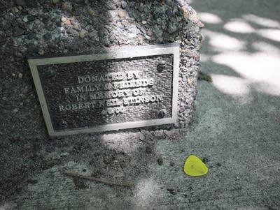 Plaque on Bob Stinson memorial bench.